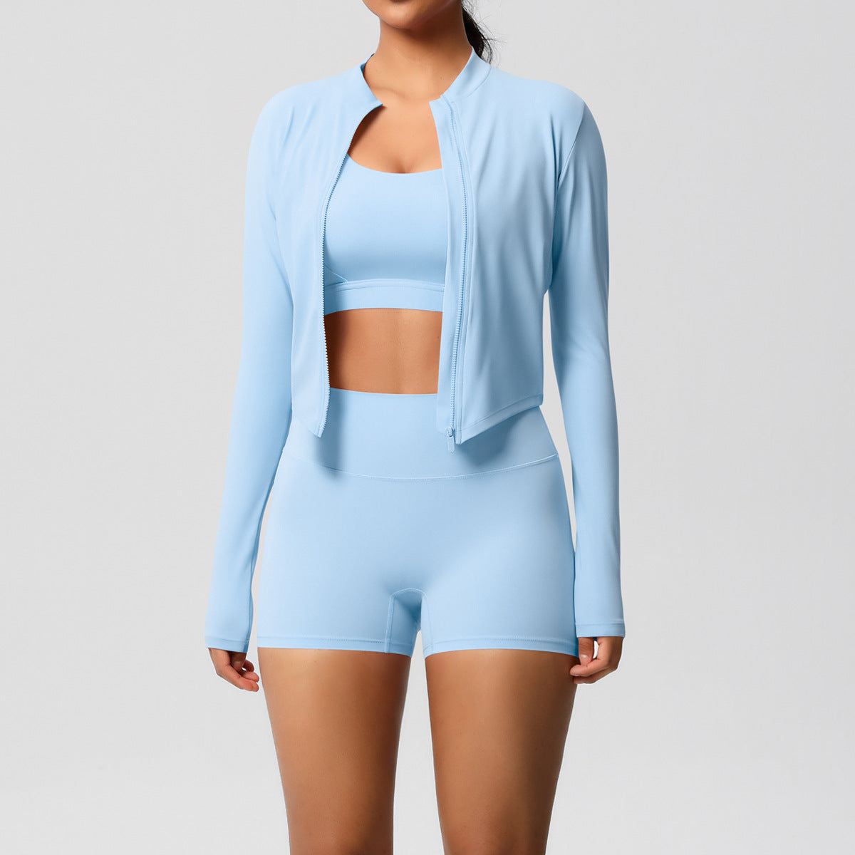 A three-piece yoga suit for women